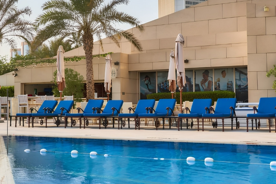 Swimming pool day at Dubai Creek hotel with relaxing atmosphere